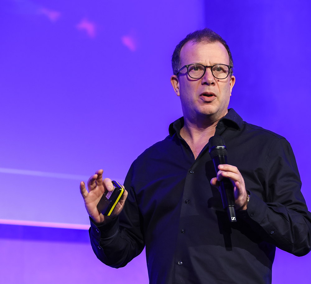 Jonny Bentwood presenting at The TravMedia Summit 2026